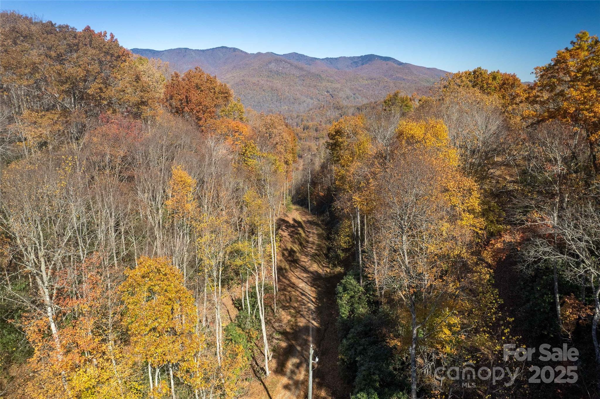 a view of mountains and valleys