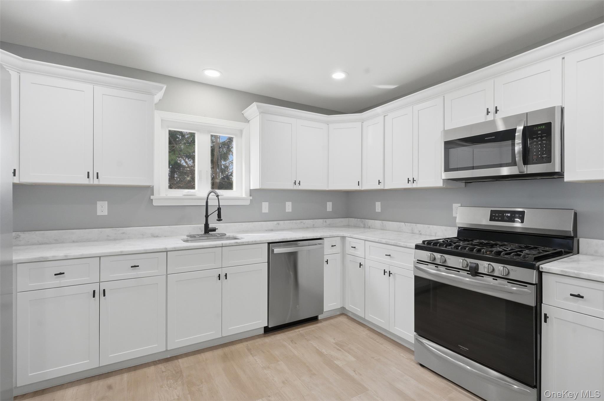 1227 Burlingham Road Pine Bush, NY 12566 - Photo 15 of 39 Kitchen featuring stainless steel appliances, white cabinetry, granite countertops, and recessed lighting
