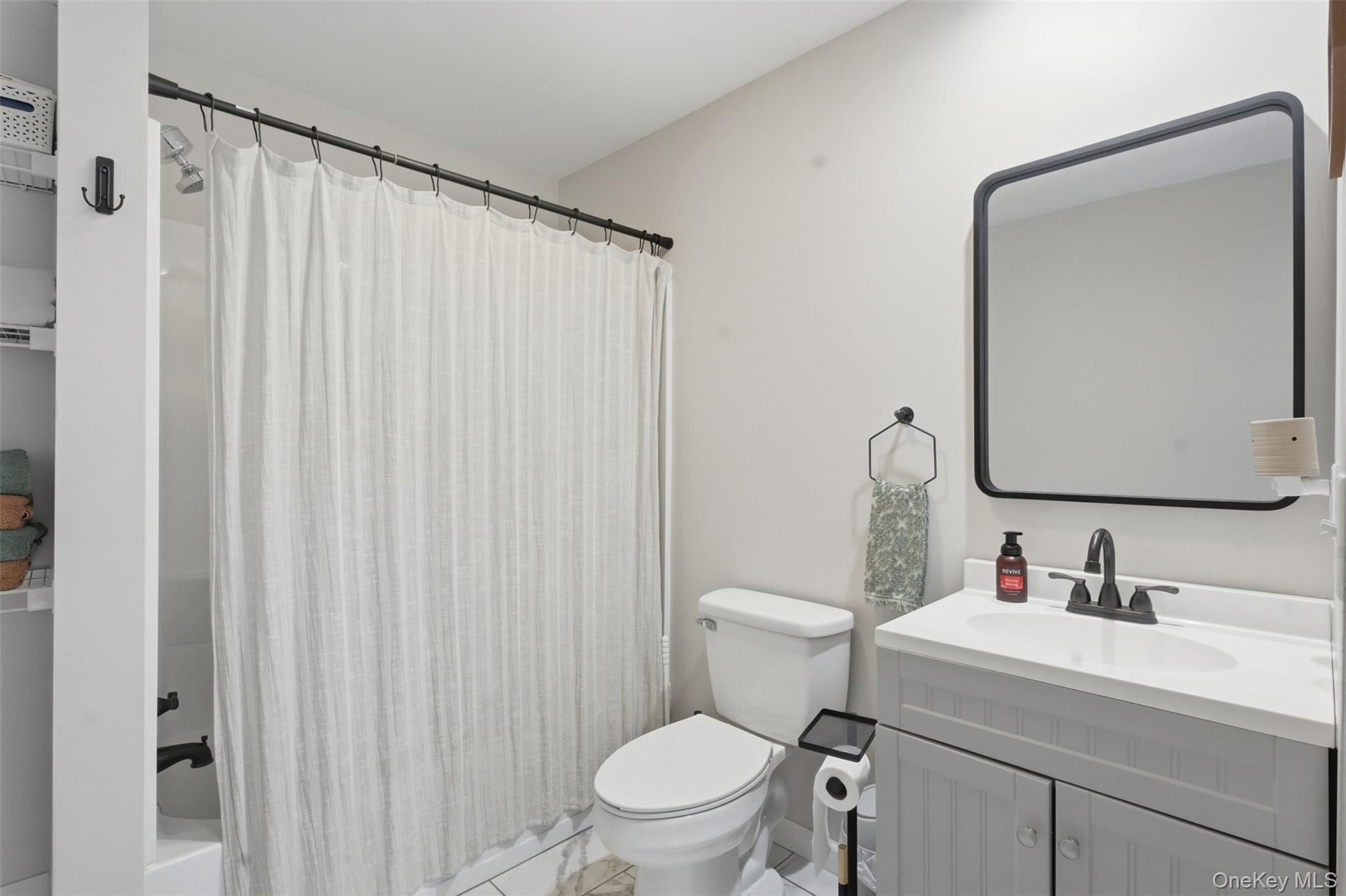 1227 Burlingham Road Pine Bush, NY 12566 - Photo 20 of 39 Second full bathroom with vanity and shower / bathtub combination with curtain
