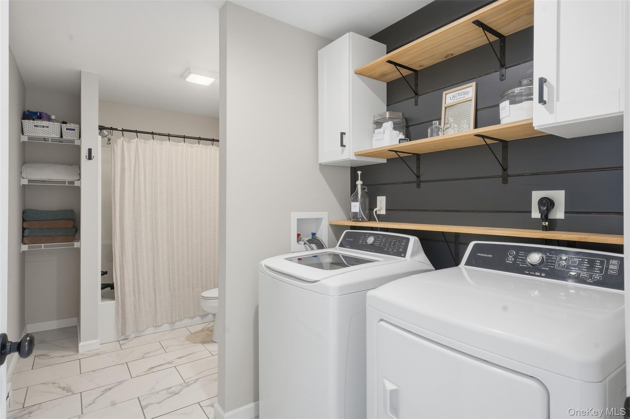 1227 Burlingham Road Pine Bush, NY 12566 - Photo 21 of 39 Laundry area with washer and dryer in second full bath