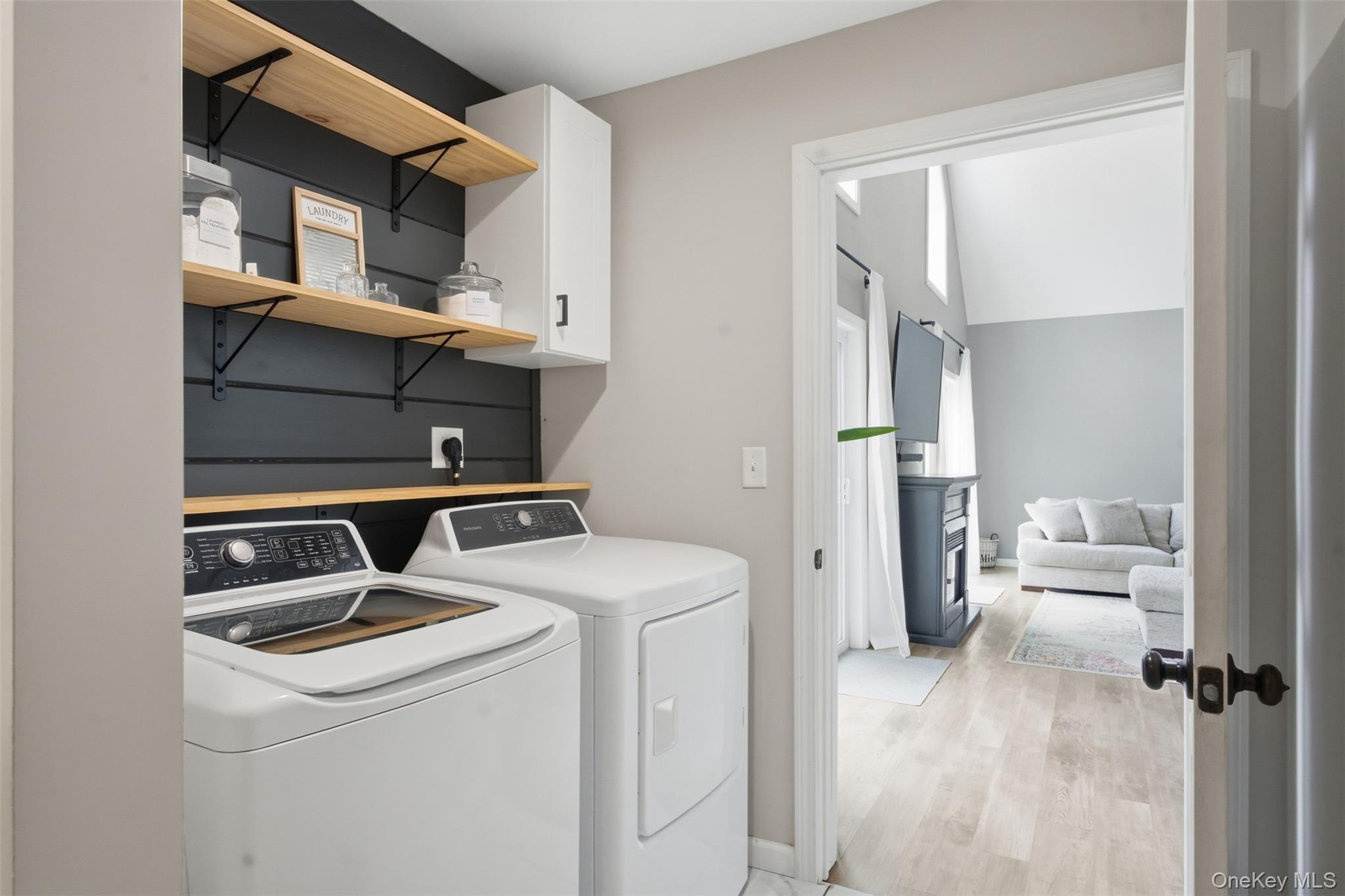 1227 Burlingham Road Pine Bush, NY 12566 - Photo 22 of 39 Laundry room with cabinet space, washing machine and dryer
