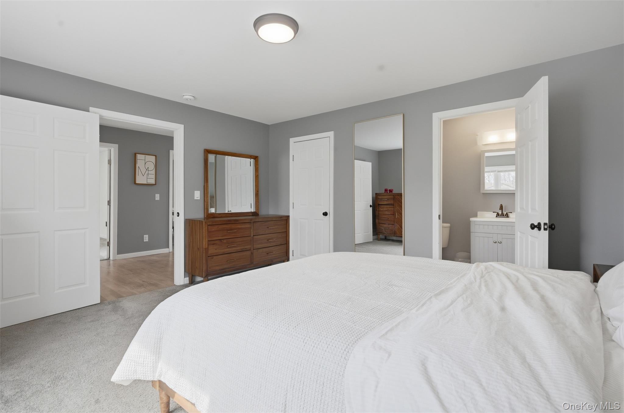 1227 Burlingham Road Pine Bush, NY 12566 - Photo 27 of 39 Primary bedroom with carpet floors, a closet, and ensuite bathroom and walk in closet.