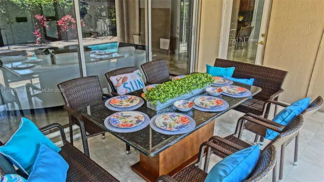 a table and chairs in a patio