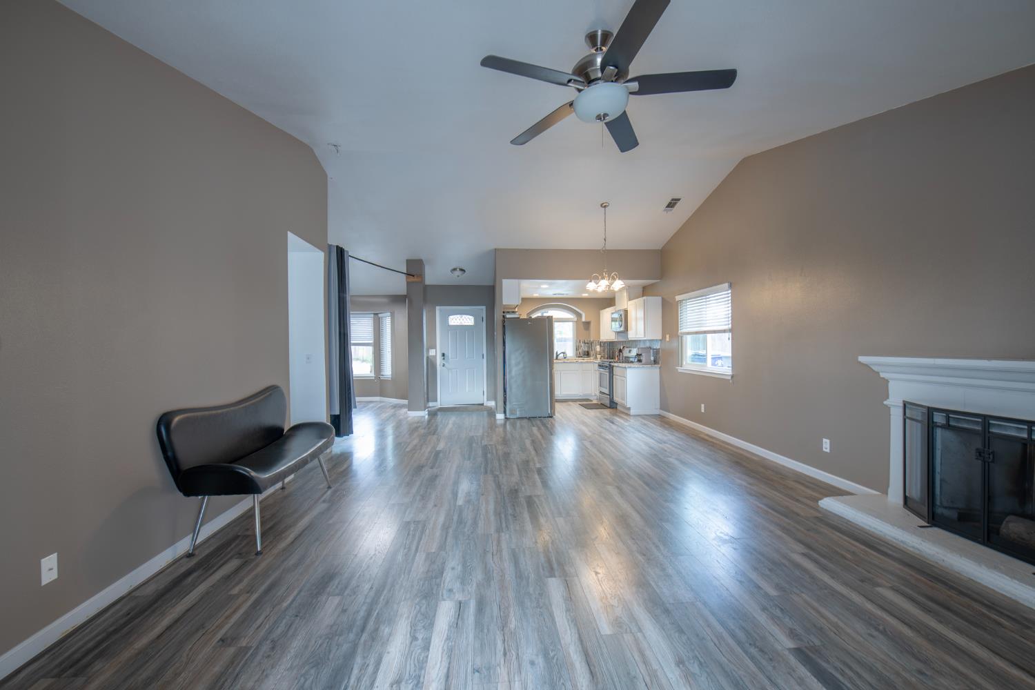 338 North Filbert Avenue Clovis, CA 93611 - Photo 11 of 33 wooden floor in an empty room with a window