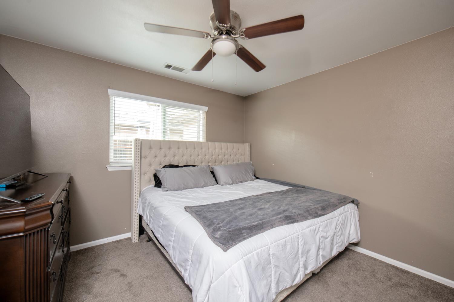 338 North Filbert Avenue Clovis, CA 93611 - Photo 23 of 33 Laminate under rug