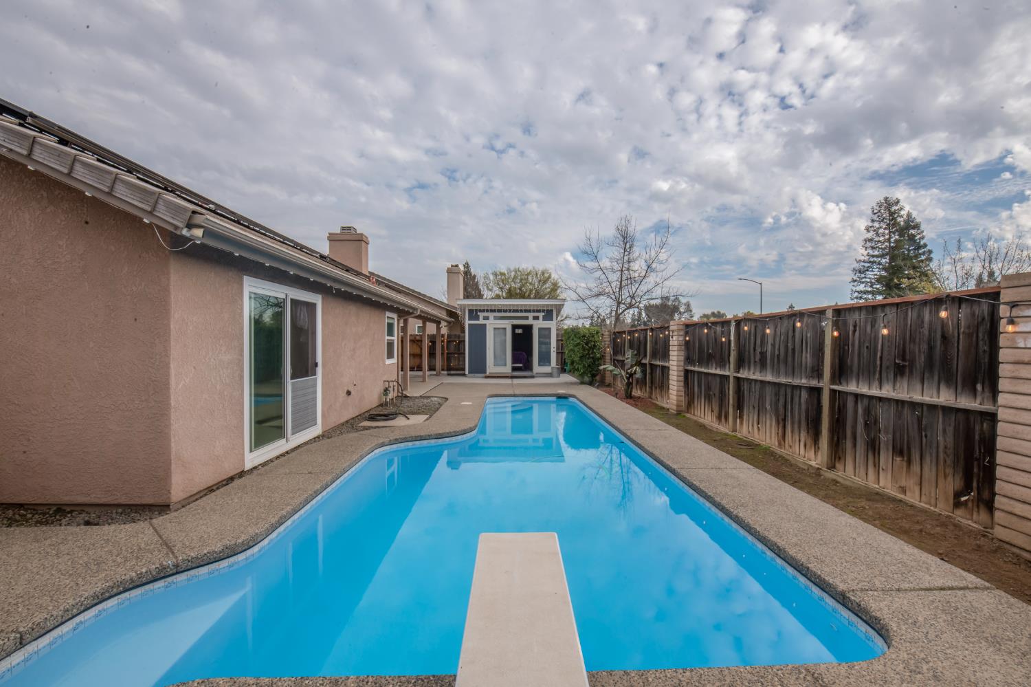 338 North Filbert Avenue Clovis, CA 93611 - Photo 31 of 33 a view of a house with swimming pool