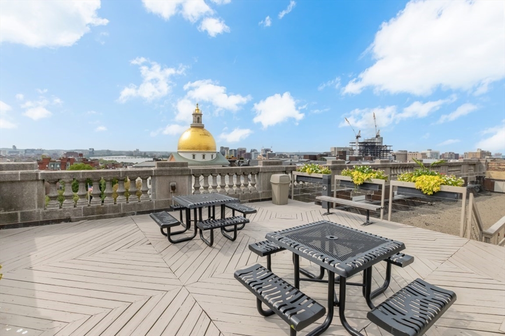 21 Beacon Street, Unit 6F Boston, MA 02108 - Photo 1 of 16 a view of a terrace with furniture