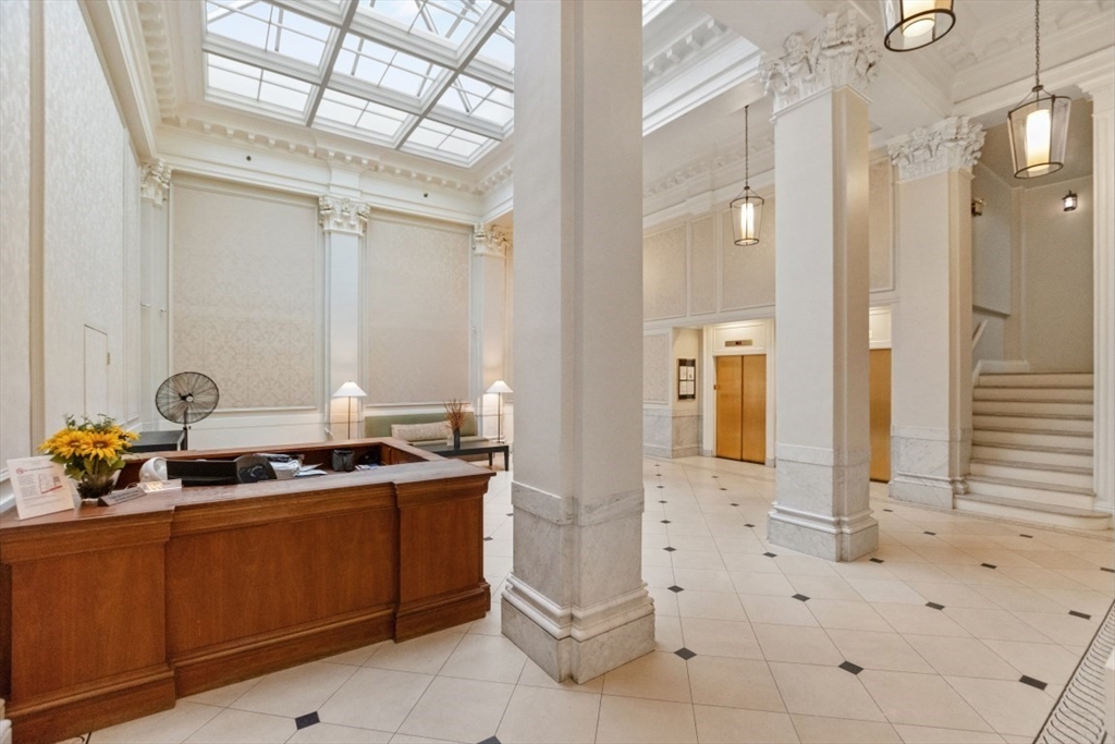 21 Beacon Street, Unit 6F Boston, MA 02108 - Photo 13 of 16 a kitchen with a sink and cabinets