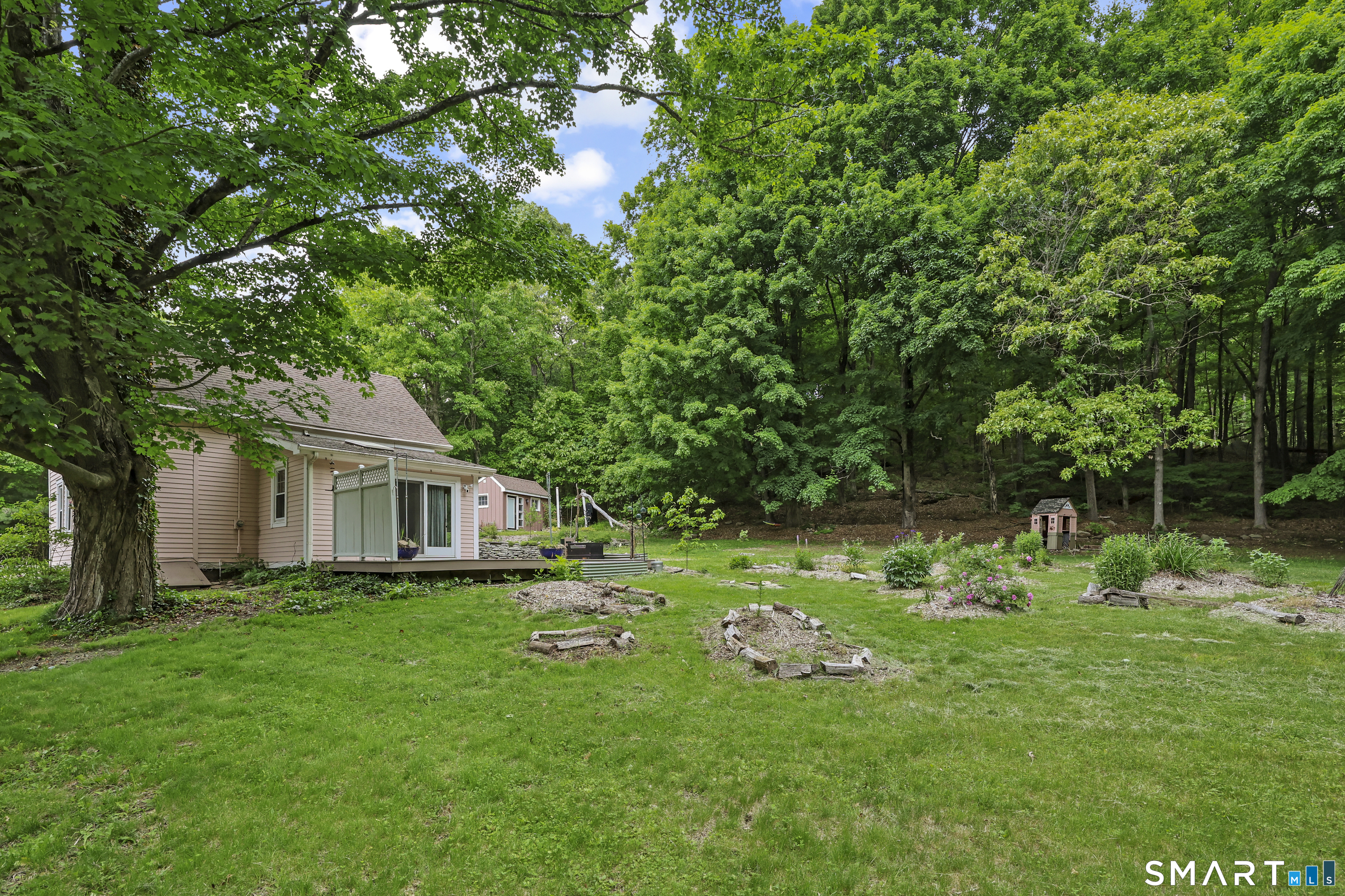 917 Hopewell Road Glastonbury, CT 06033 - Photo 35 of 39 a front view of a house with garden