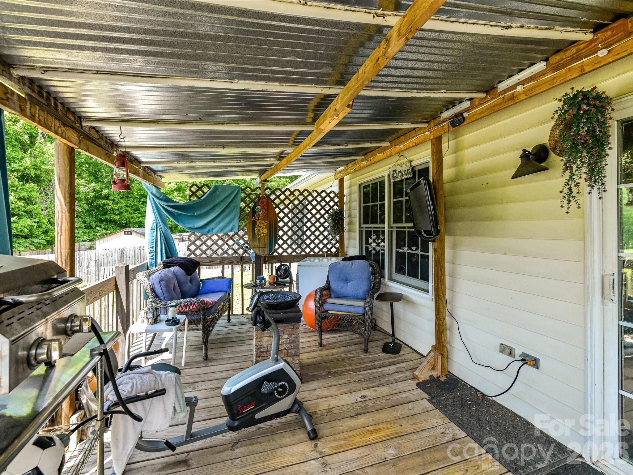 1472 Ridgewood Drive Concord, NC 28027 - Photo 25 of 30 a view of a chairs and table in a patio