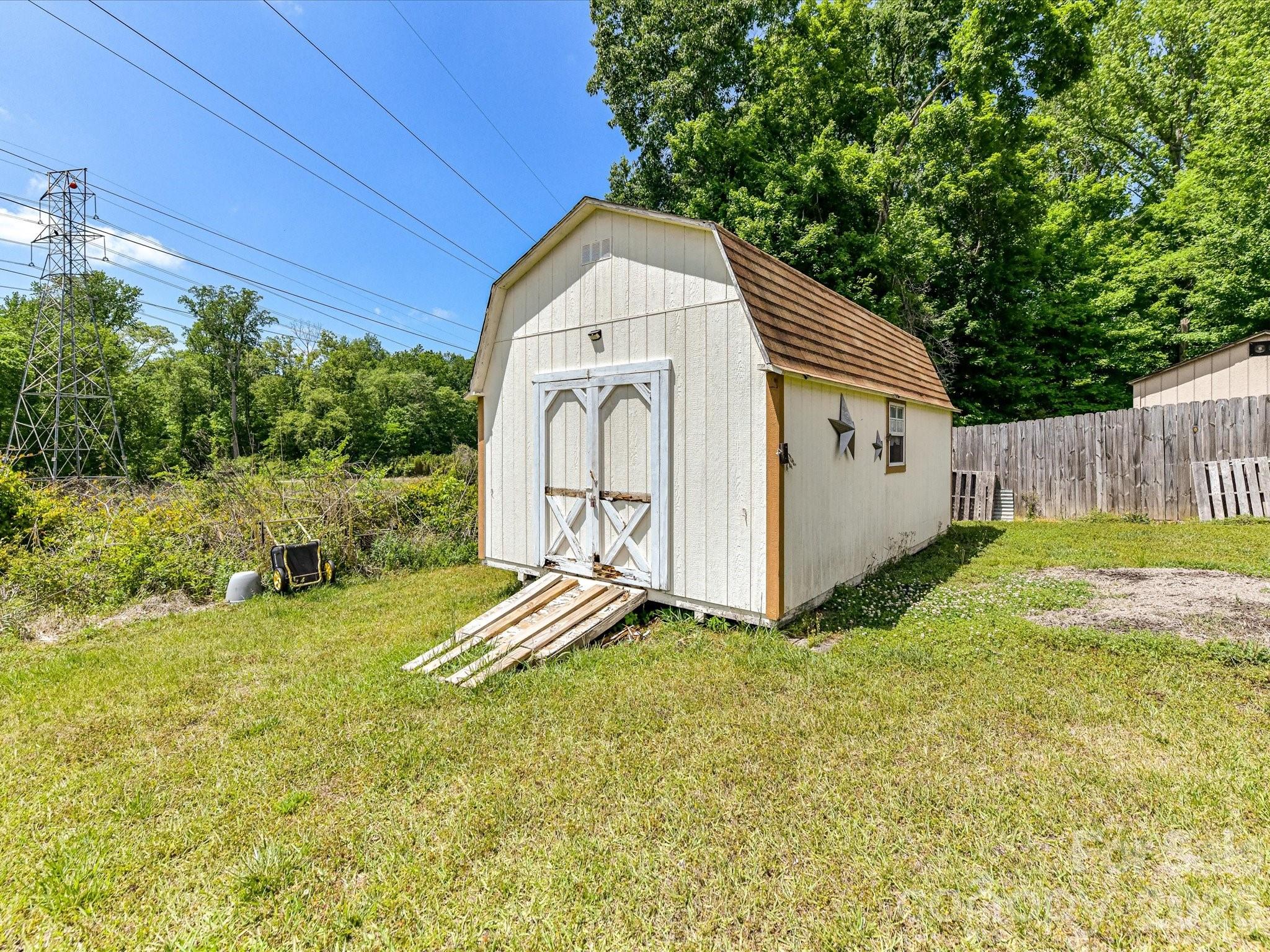 1472 Ridgewood Drive Concord, NC 28027 - Photo 29 of 30 a view of backyard with tub and trees
