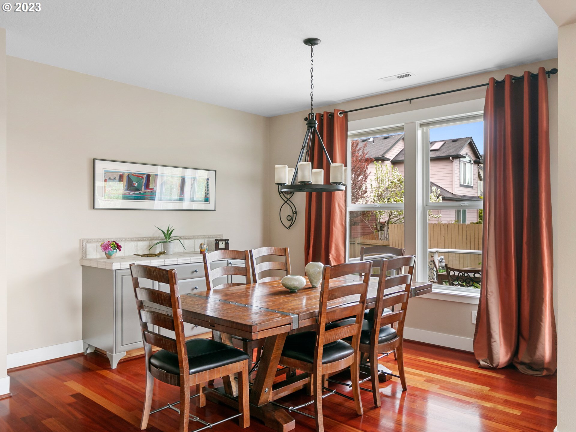 1156 Southeast Polk Street Camas, WA 98607 - Photo 11 of 34 a view of a dining room with furniture window and wooden floor