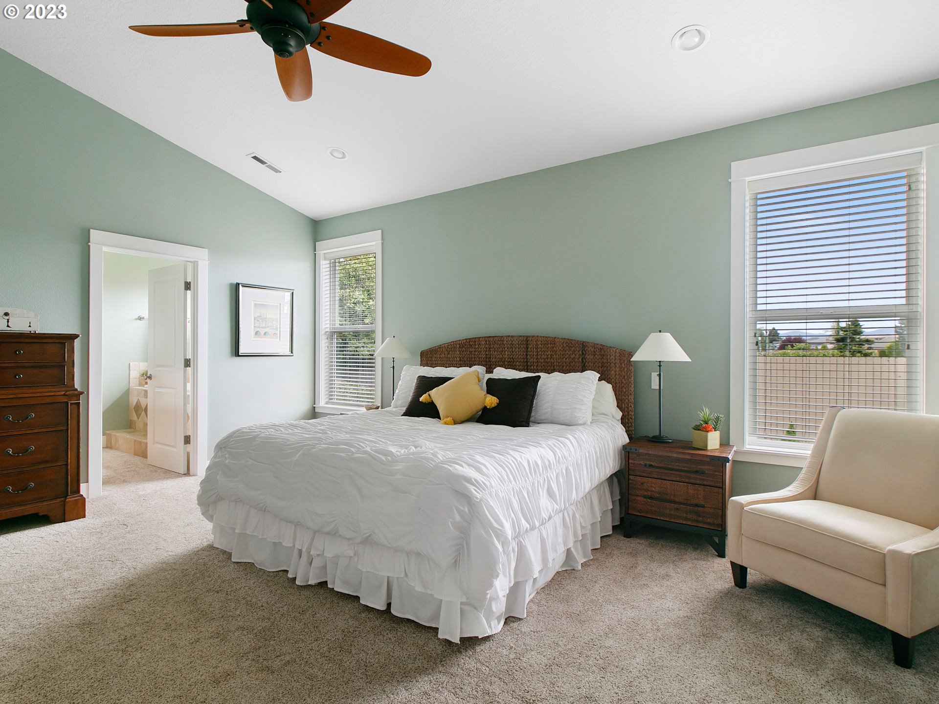 1156 Southeast Polk Street Camas, WA 98607 - Photo 16 of 34 a bedroom with a bed couch and window
