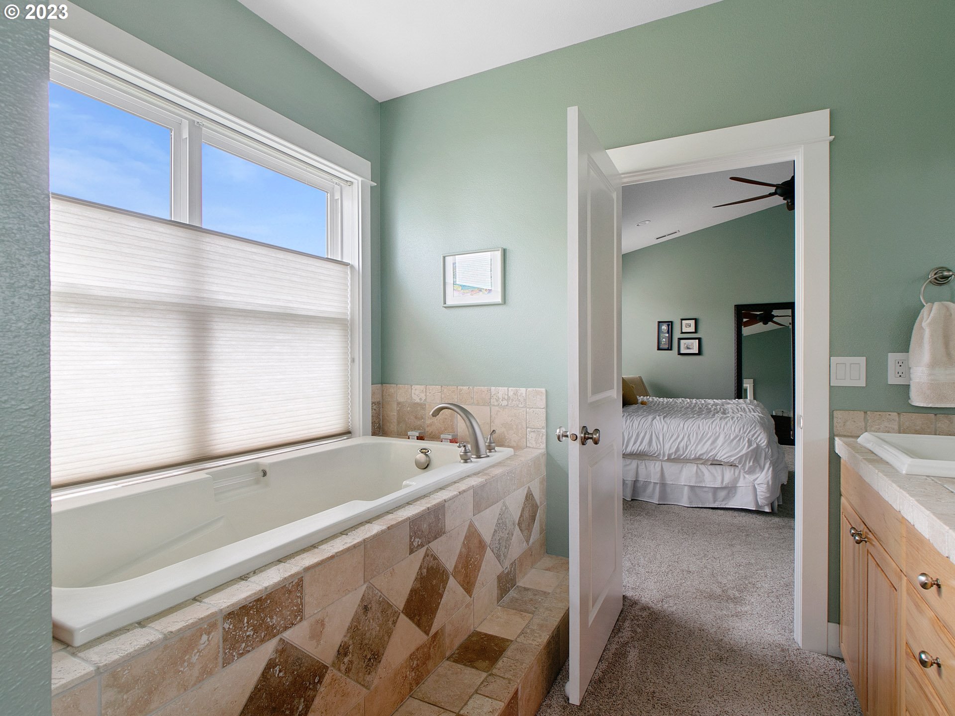 1156 Southeast Polk Street Camas, WA 98607 - Photo 20 of 34 a spacious bathroom with 2 bed and a bathtub