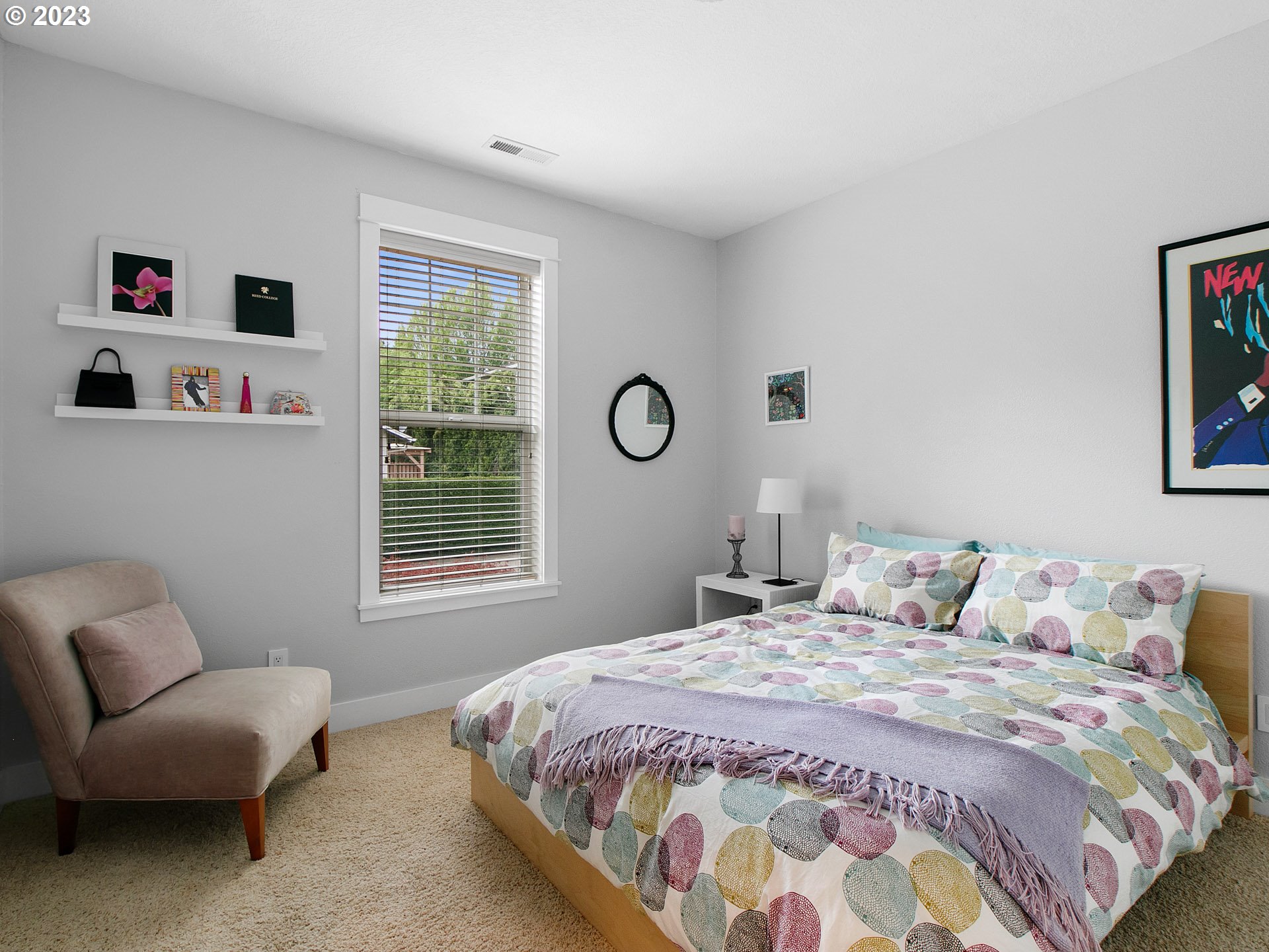 1156 Southeast Polk Street Camas, WA 98607 - Photo 23 of 34 a bedroom with a bed couch and window