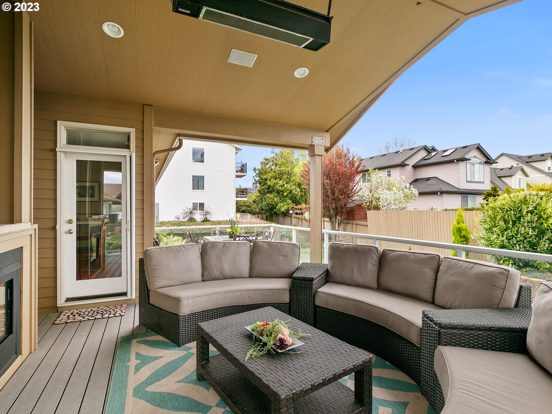 1156 Southeast Polk Street Camas, WA 98607 - Photo 26 of 34 a balcony with furniture and a fireplace