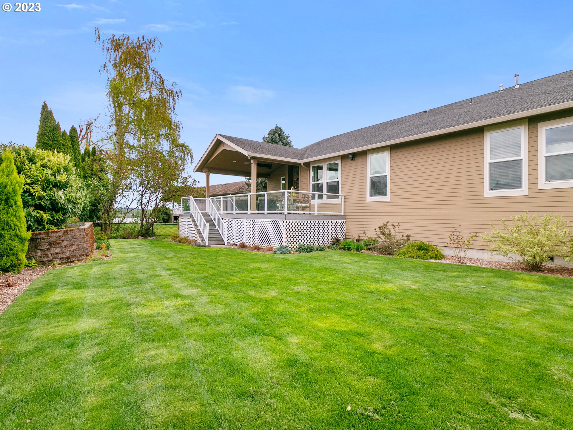 1156 Southeast Polk Street Camas, WA 98607 - Photo 27 of 34 a front view of a house with garden