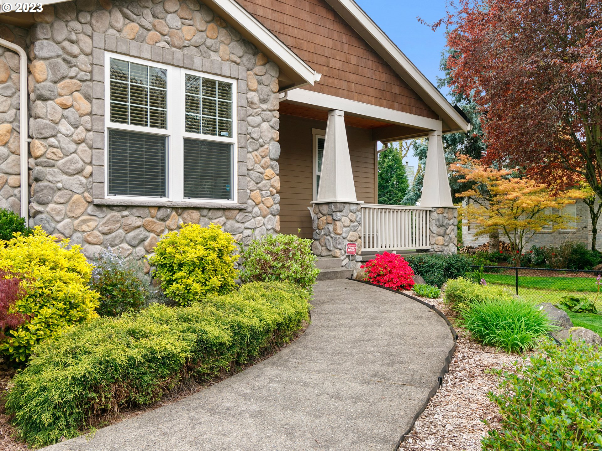 1156 Southeast Polk Street Camas, WA 98607 - Photo 28 of 34 a front view of a house with a yard