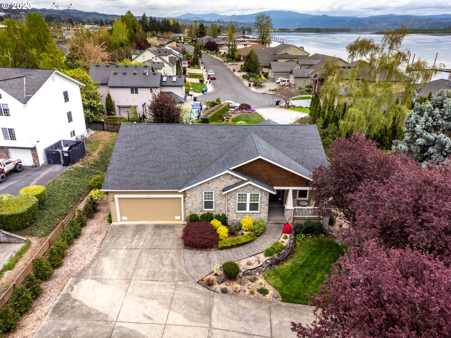1156 Southeast Polk Street Camas, WA 98607 - Photo 32 of 34 an aerial view of a house with a swimming pool yard and outdoor seating