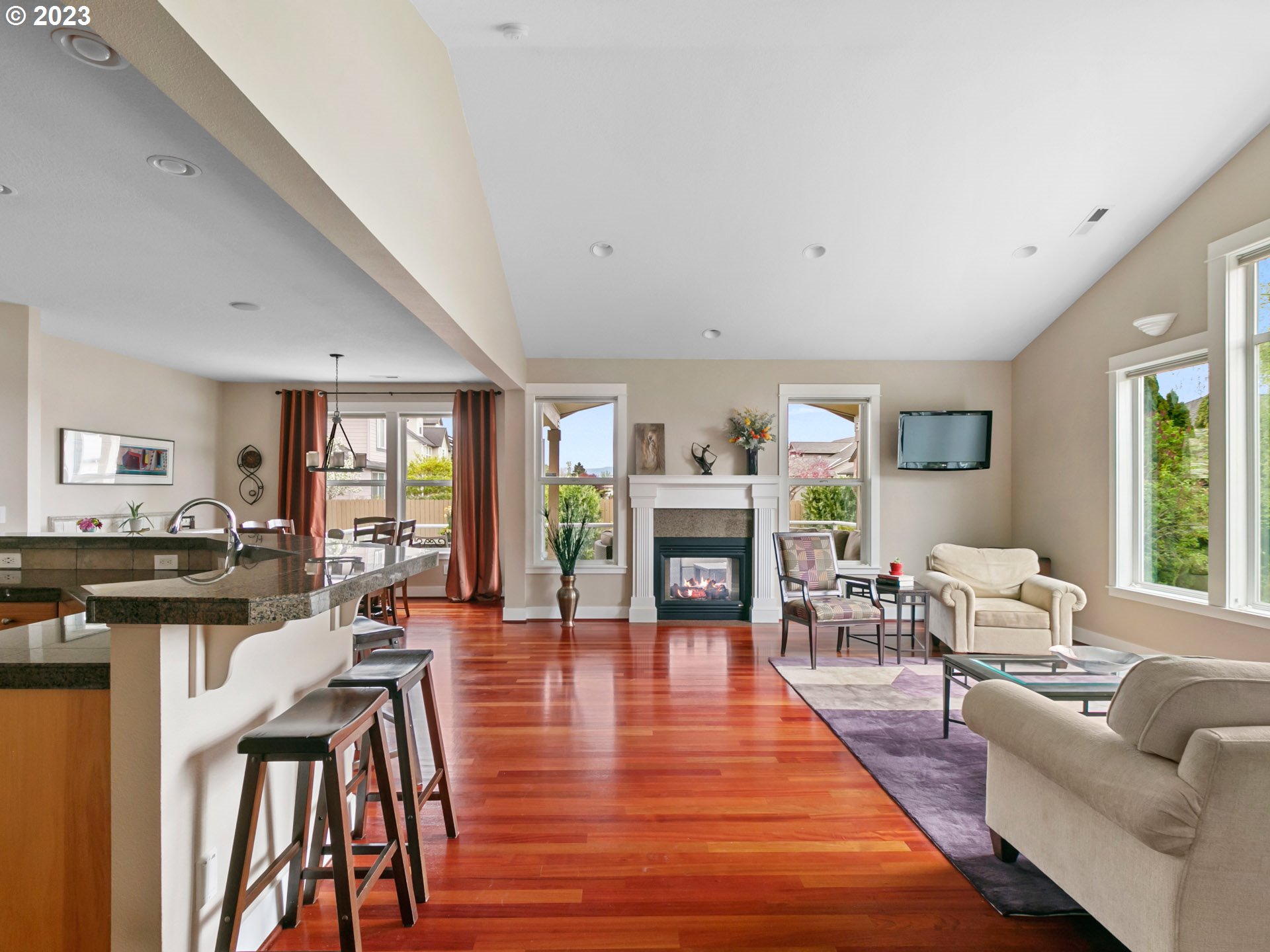 1156 Southeast Polk Street Camas, WA 98607 - Photo 7 of 34 a living room with furniture and a fireplace
