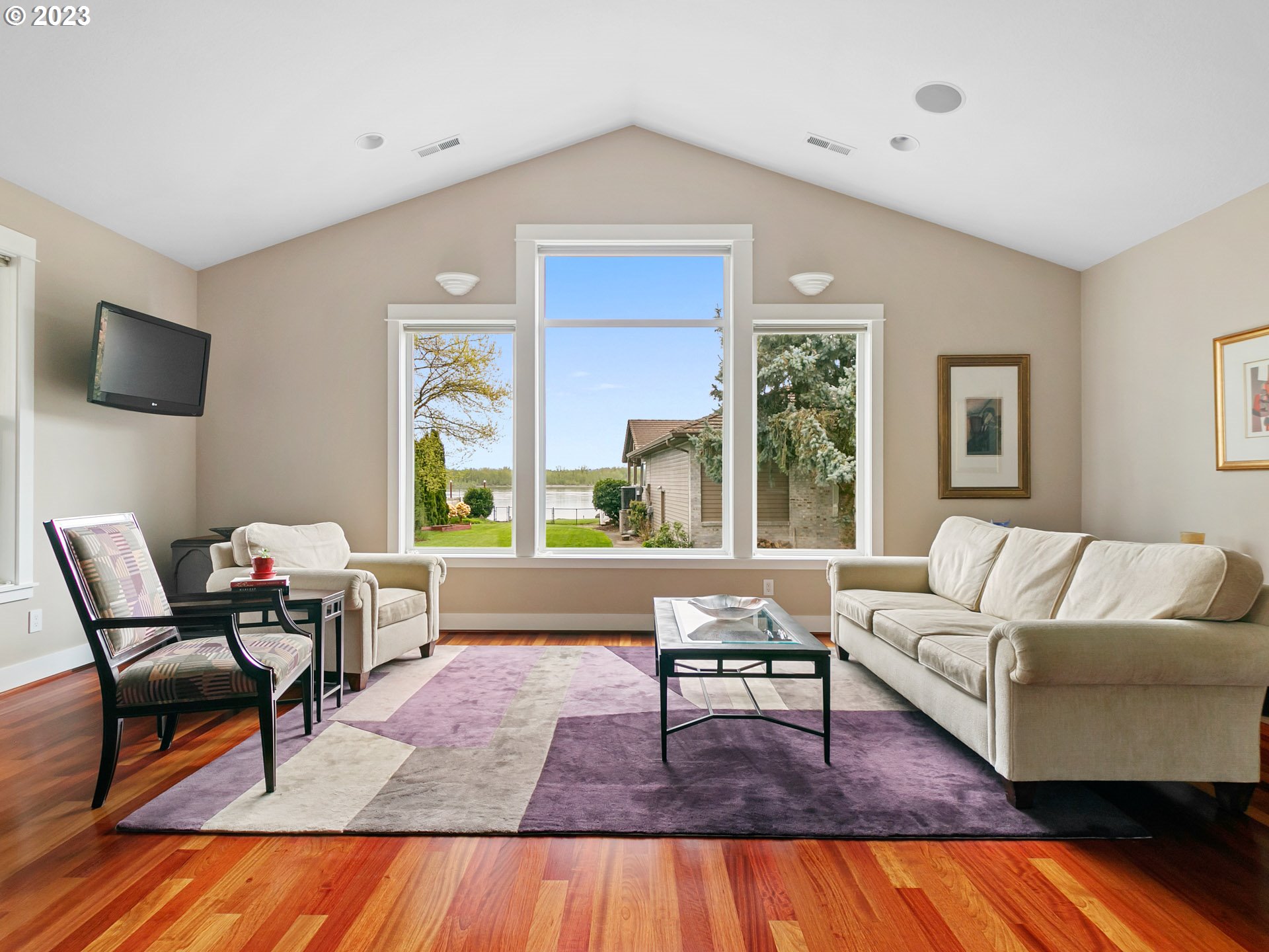 1156 Southeast Polk Street Camas, WA 98607 - Photo 8 of 34 a living room with furniture and a flat screen tv