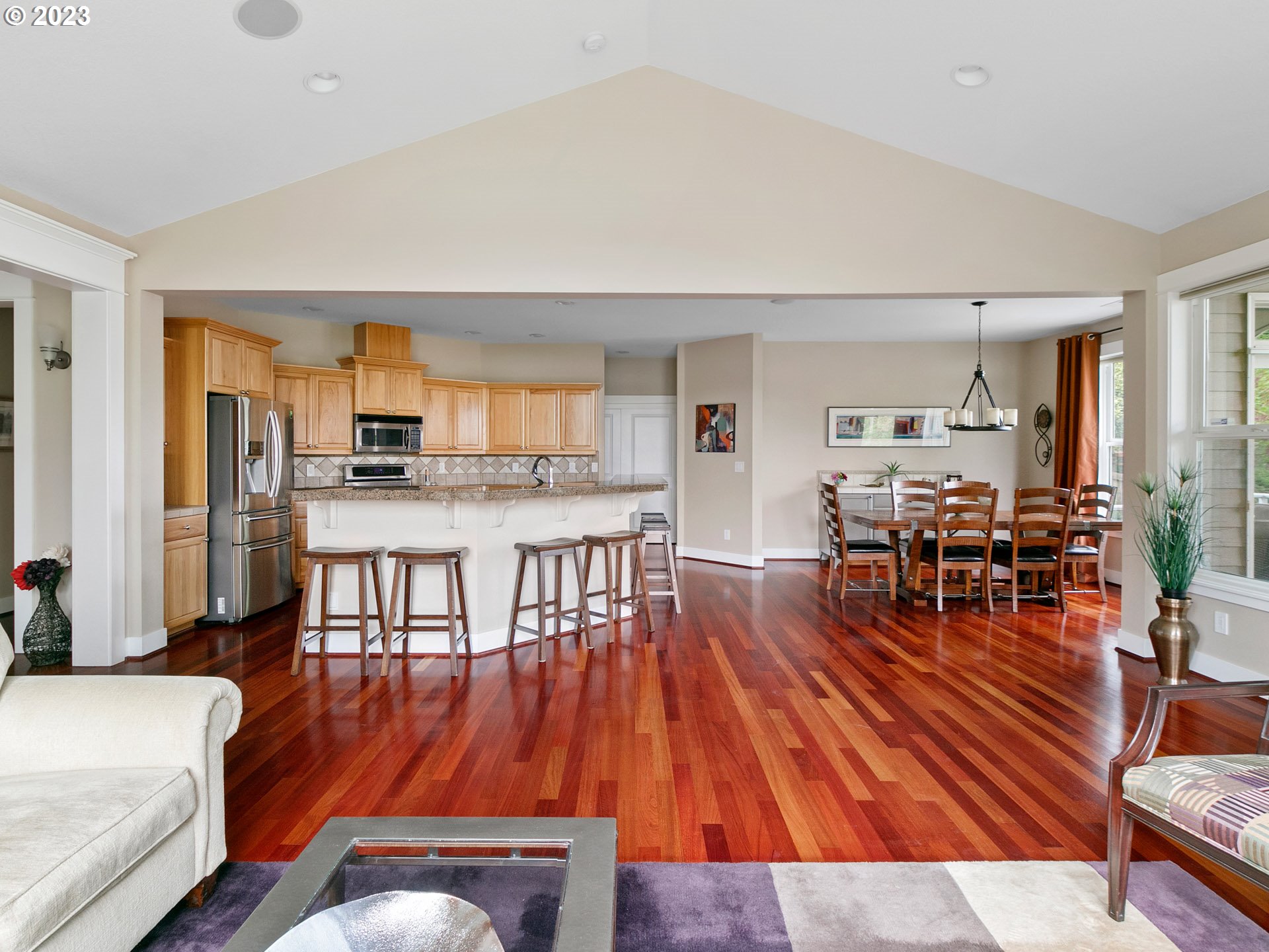 1156 Southeast Polk Street Camas, WA 98607 - Photo 10 of 34 a living room with furniture and kitchen view with wooden floor