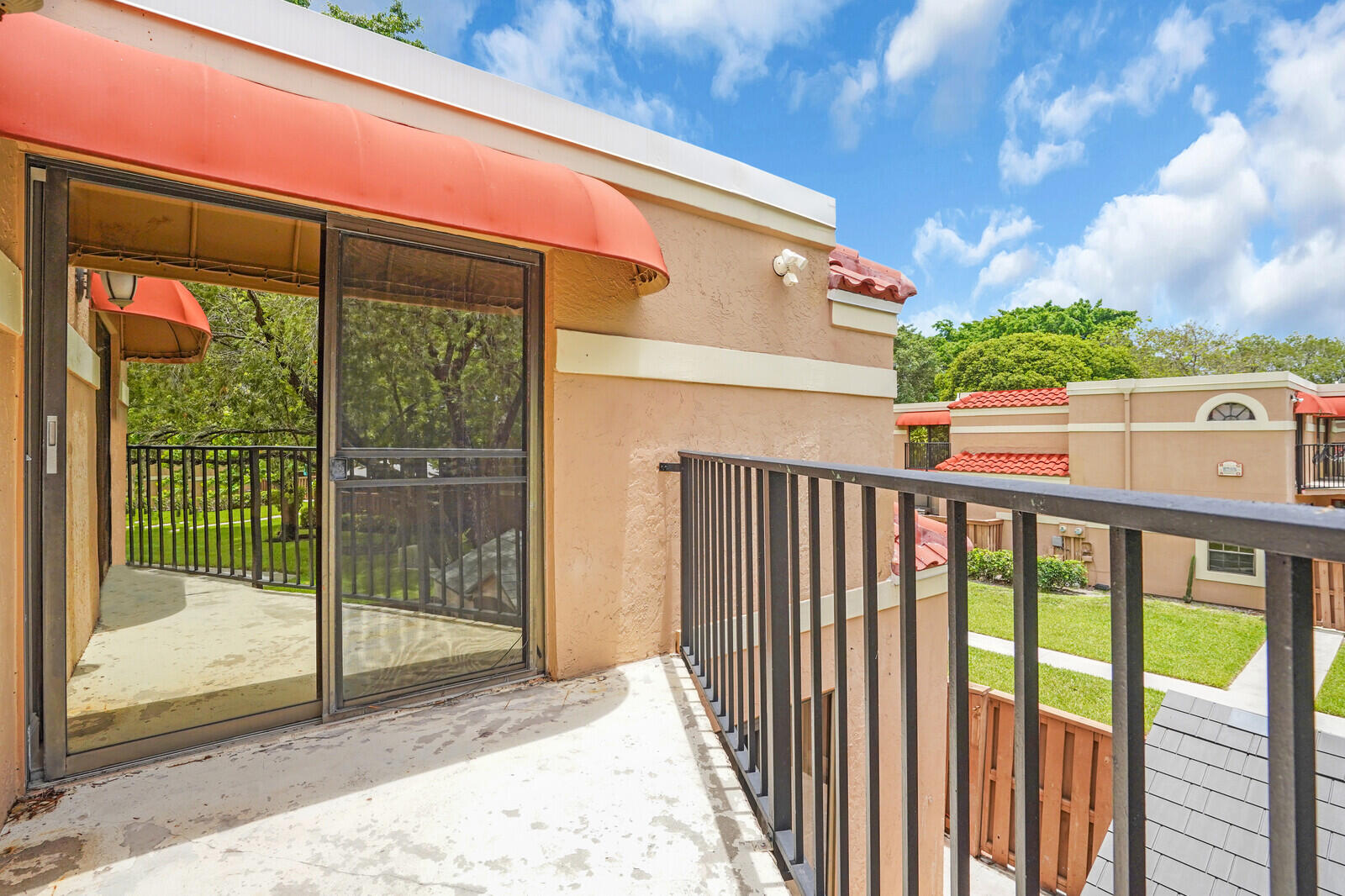 8291 Thames Boulevard, Unit C Boca Raton, FL 33433 - Photo 18 of 20 a balcony view with a outdoor space