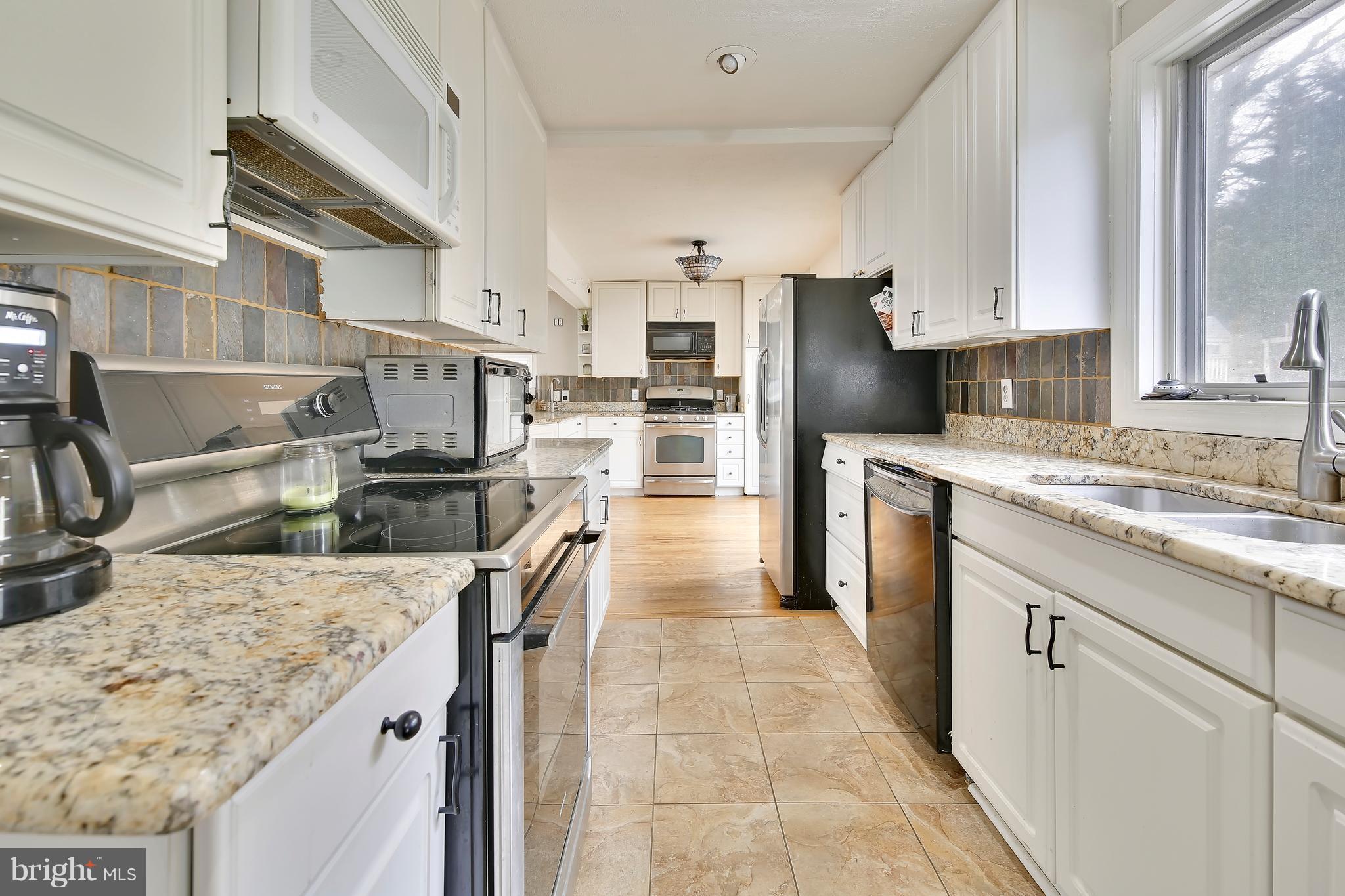956 Shore Acres Road Arnold, MD 21012 - Photo 5 of 30 Kitchen has 2 stoves and tons of cabinets!