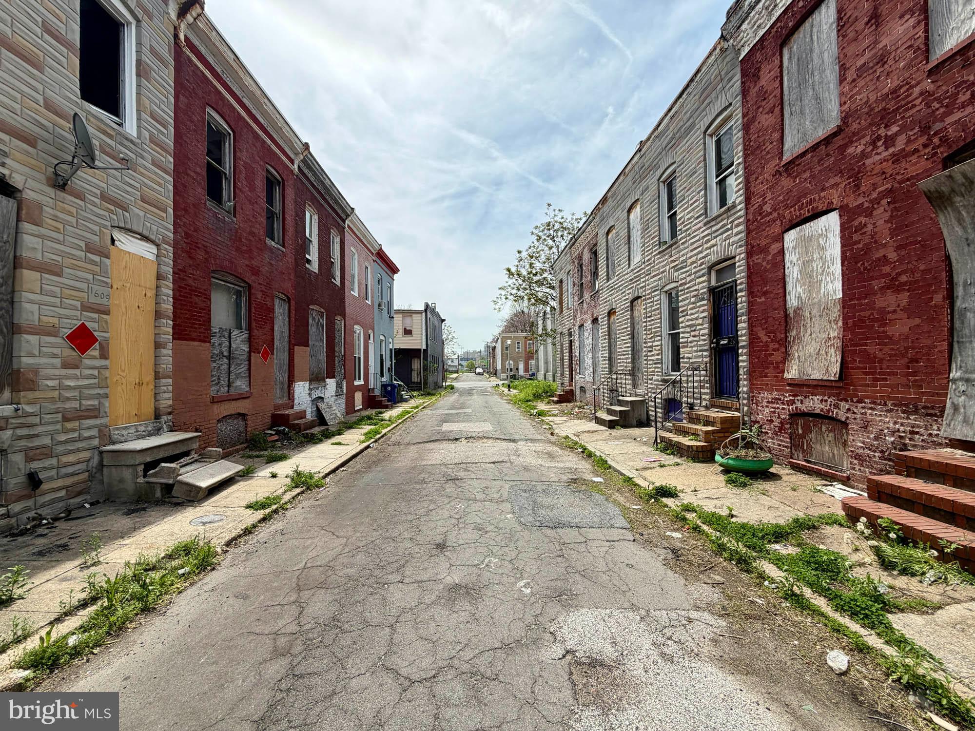1611 North Chapel Street Baltimore, MD 21213 - Photo 5 of 6 a view of a street with tall buildings