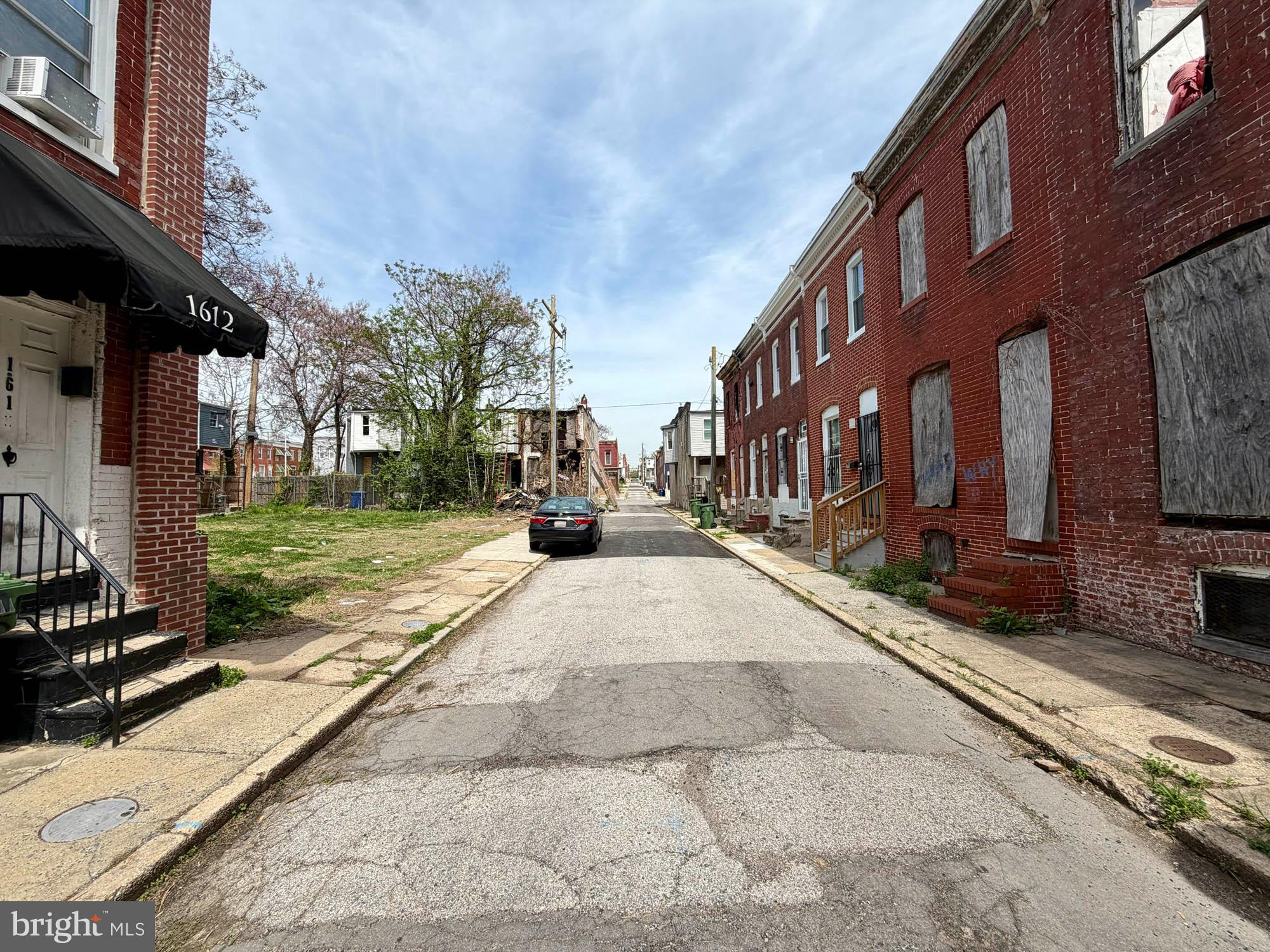 1611 North Chapel Street Baltimore, MD 21213 - Photo 6 of 6 a view of road with building