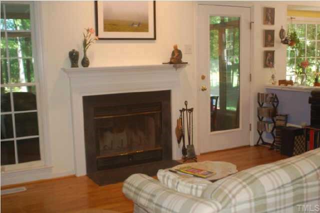 Living room with woodburning fireplace
