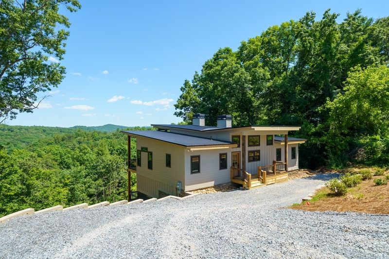216 Old Orchard Road Ellijay, GA 30536 - Photo 49 of 59 a view of a house with a patio