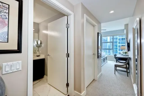 a spacious bathroom with a bathtub and a toilet