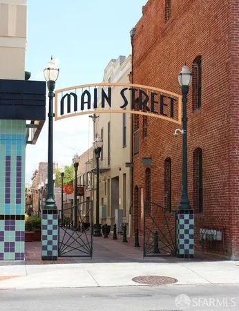 a view of a street with buildings