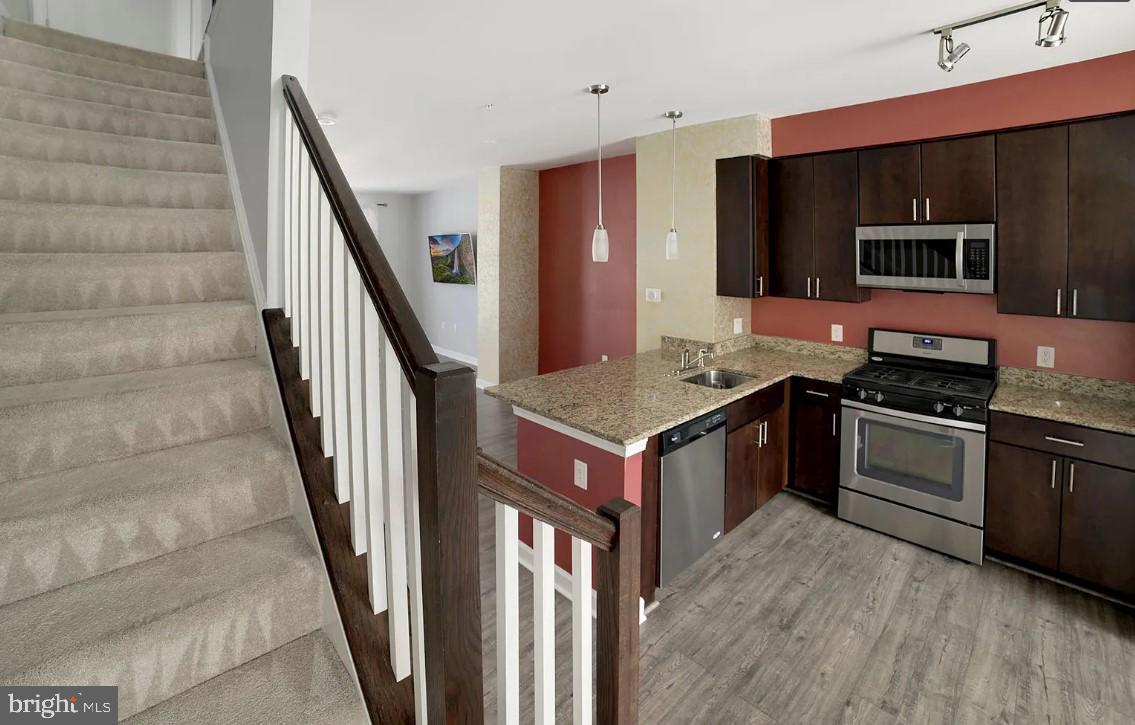 2600 Stanton Road Southeast Washington, DC 20020 - Photo 12 of 19 Kitchen & Staircase