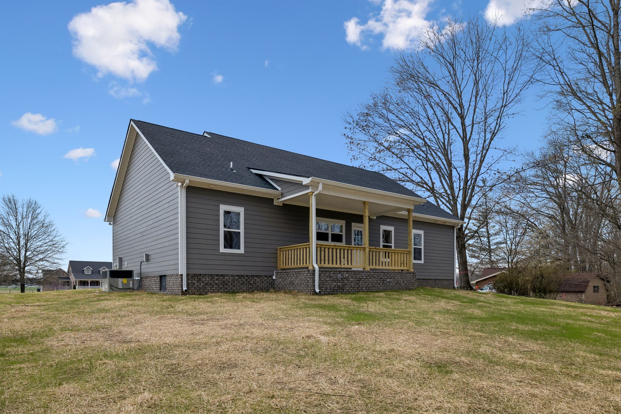 4083 Long Creek Road Lafayette, TN 37083 - Photo 36 of 36 a front view of a house with a garden
