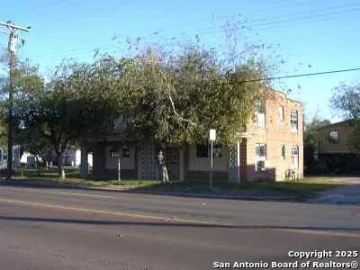 a view of a building with a street