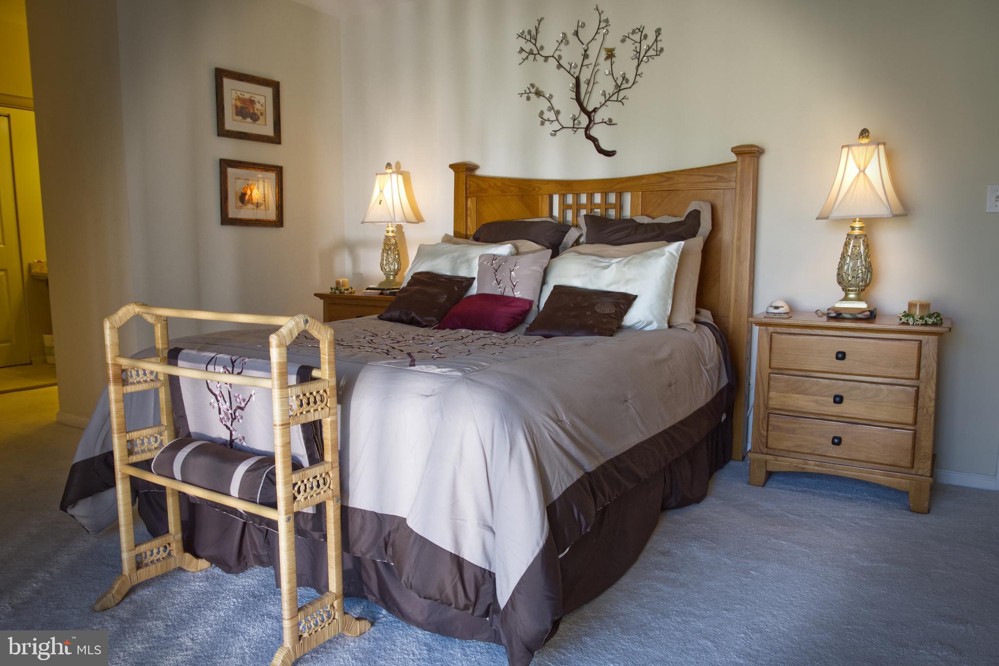 5 Greate Bay Drive Somers Point, NJ 08244 - Photo 14 of 62 a bed room with a bed and a lamp