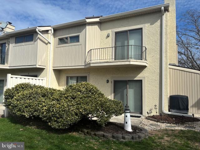 5 Greate Bay Drive Somers Point, NJ 08244 - Photo 19 of 62 a front view of a house with garden