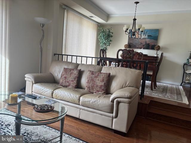5 Greate Bay Drive Somers Point, NJ 08244 - Photo 25 of 62 a living room with furniture kitchen view and a chandelier