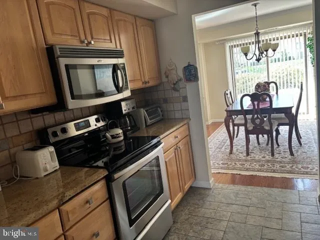 a view of a hallway with a window