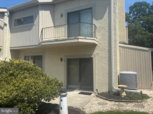 5 Greate Bay Drive Somers Point, NJ 08244 - Photo 3 of 62 a front view of a house with a porch