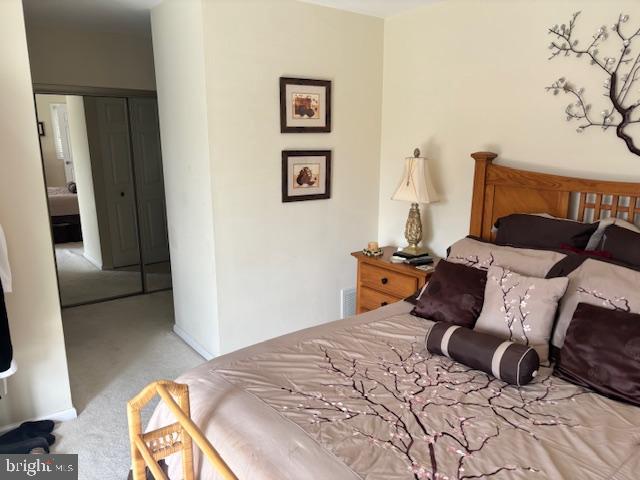 5 Greate Bay Drive Somers Point, NJ 08244 - Photo 39 of 62 a bedroom with a bed and wooden floor