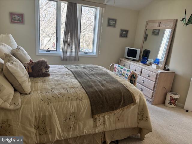 5 Greate Bay Drive Somers Point, NJ 08244 - Photo 43 of 62 a bed sitting in a bedroom next to a window