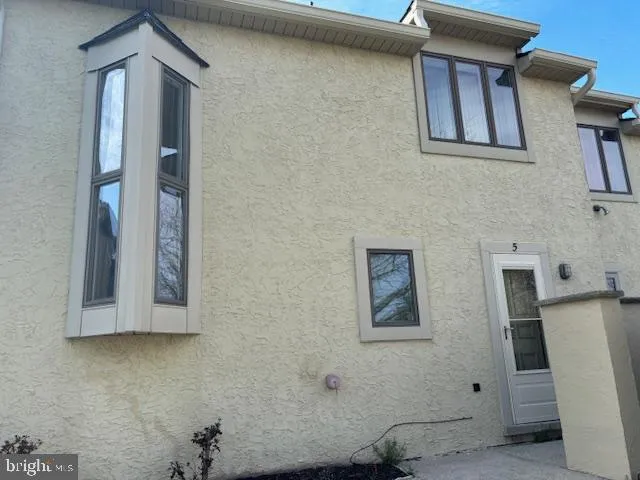 a view of a house with a porch