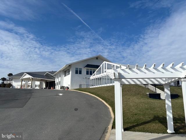 5 Greate Bay Drive Somers Point, NJ 08244 - Photo 59 of 62 a view of a house with a porch