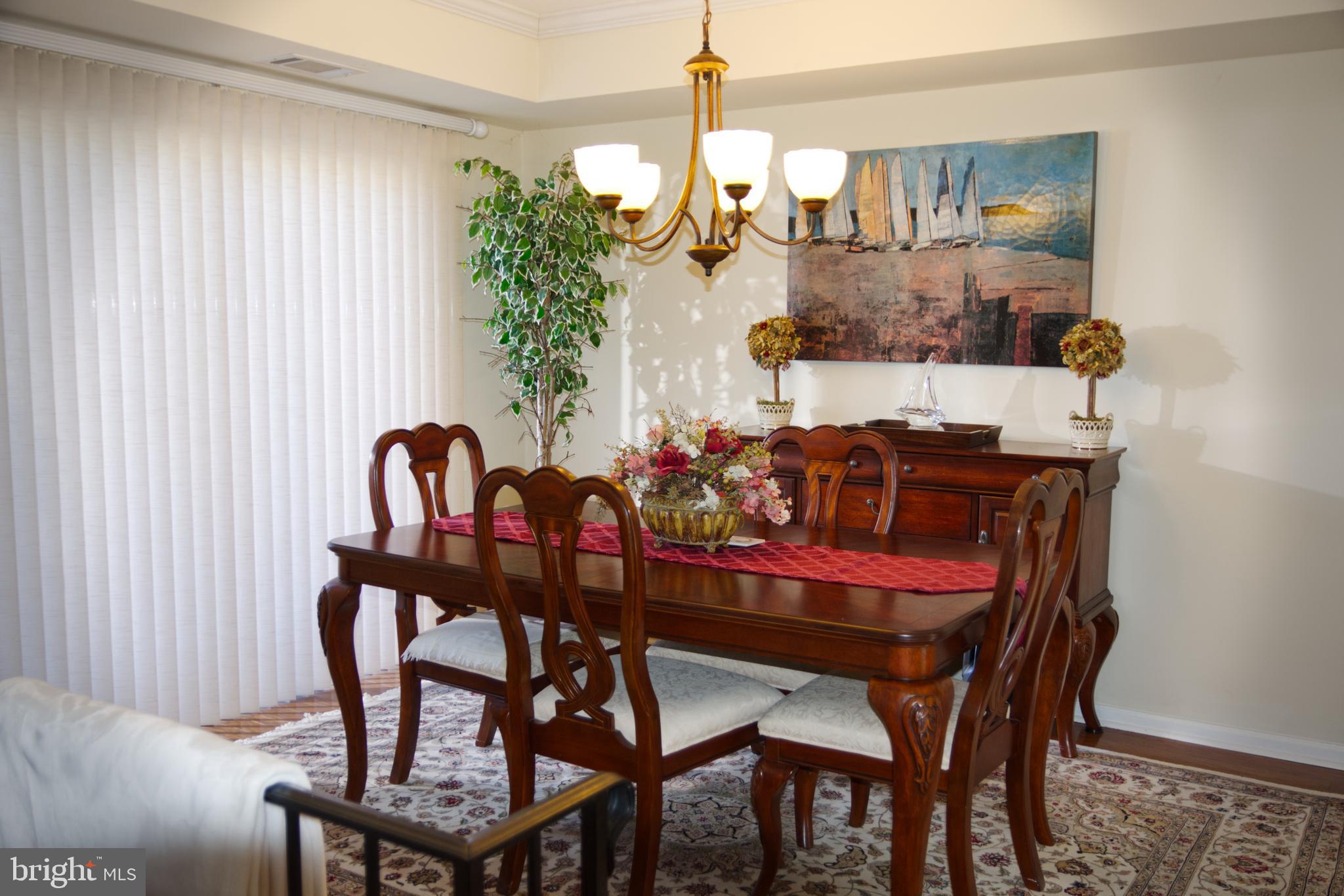 5 Greate Bay Drive Somers Point, NJ 08244 - Photo 10 of 62 a view of a dining room with furniture and window
