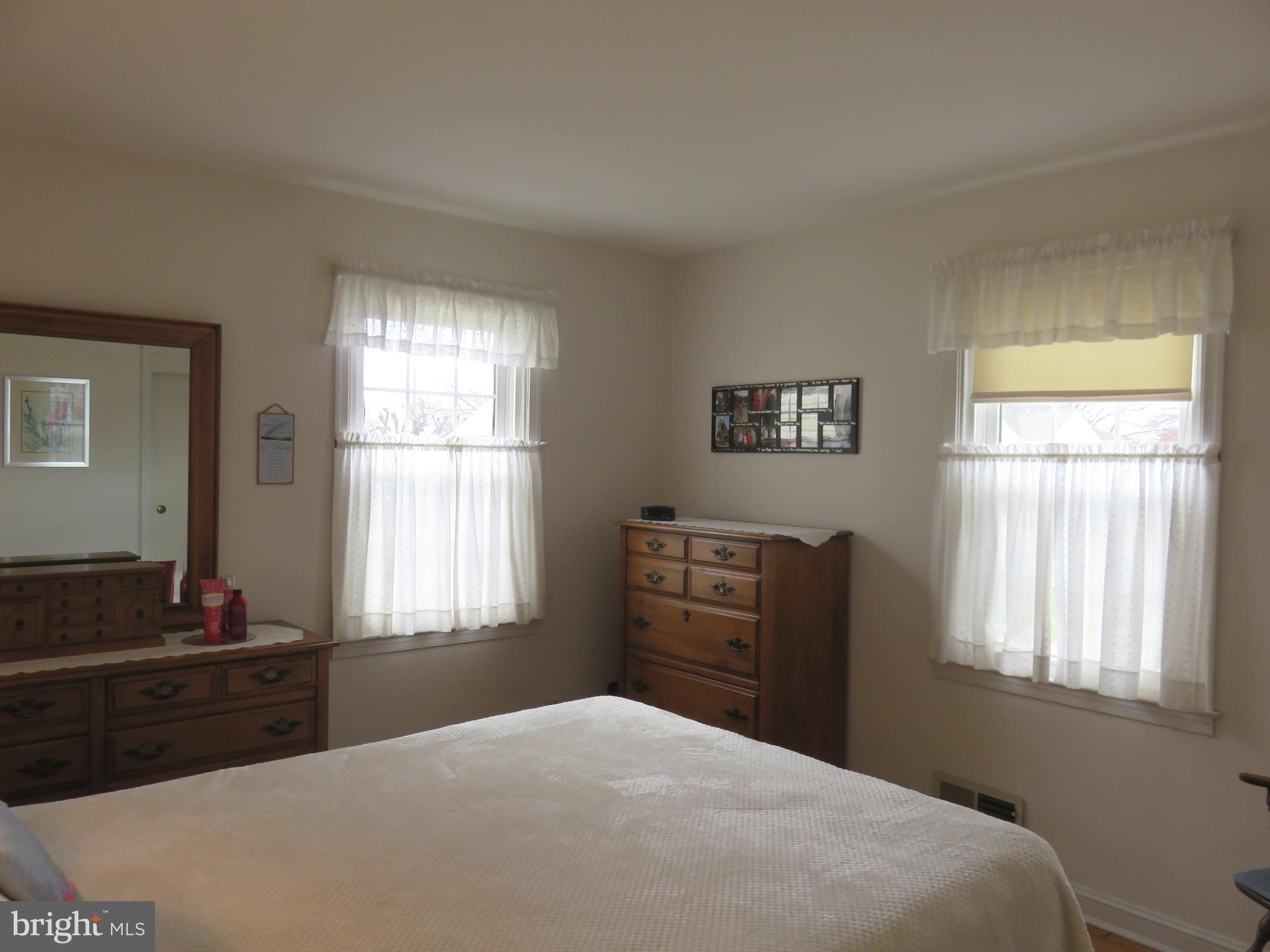 1804 Forrest Road Baltimore, MD 21234 - Photo 10 of 25 a bedroom with a bed and a window