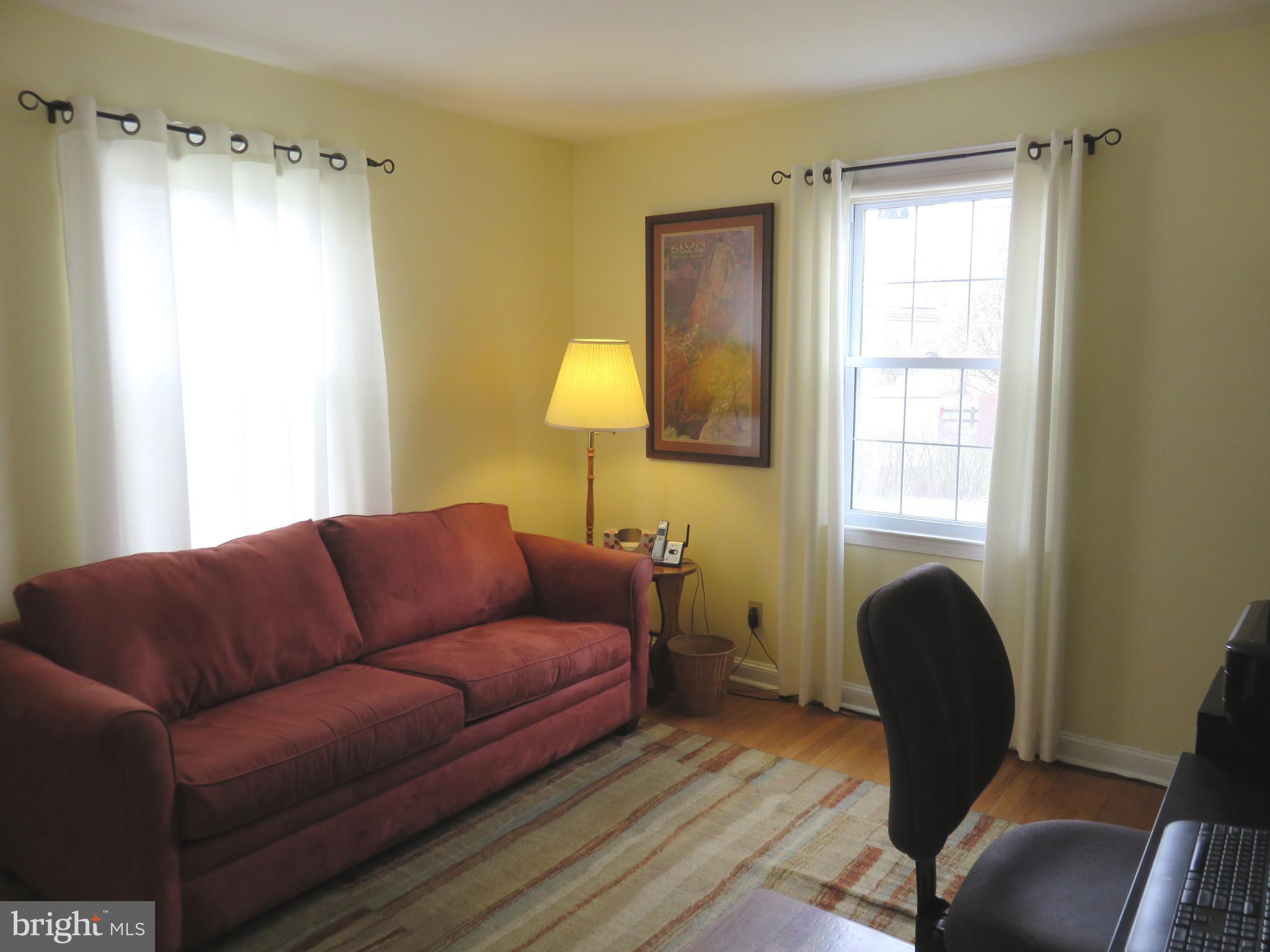 1804 Forrest Road Baltimore, MD 21234 - Photo 12 of 25 a living room with furniture and a window