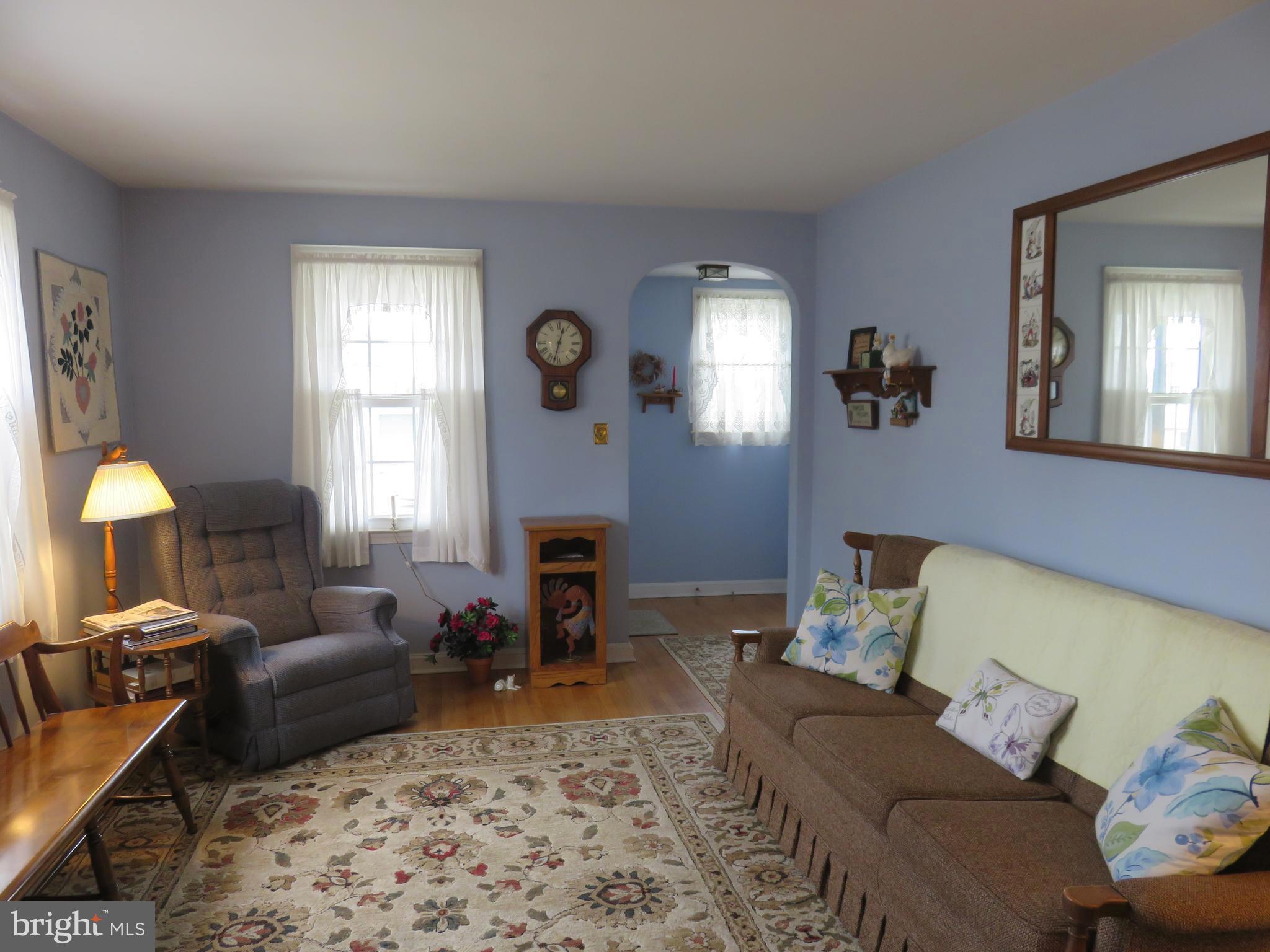 1804 Forrest Road Baltimore, MD 21234 - Photo 3 of 25 a living room with furniture and a large window